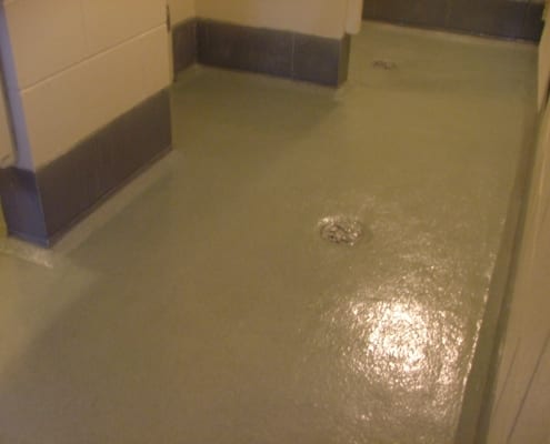 Yamhill County Jail restroom epoxy flake floor installation