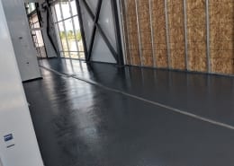Urethane commercial floor install with epoxy topcoat at Nordic Brew Works in Montana