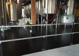 Black epoxy brewery flooring installation in Seattle Washington