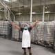 Worker at bakery celebrating new epoxy floors