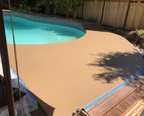 Residential poolside coating installation in Oregon