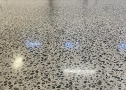 Food processing flooring installation polish to rock and seal