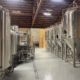 Northern California epoxy brewery flooring installation with brew tanks in Chico CA