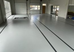 Car shop repair bay epoxy flooring installation in Salem Oregon Car Dealership