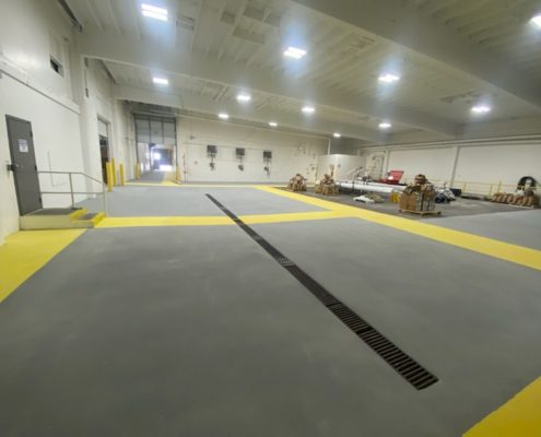 New Seasons food preperation processing area epoxy flooring with safety striping and walkways
