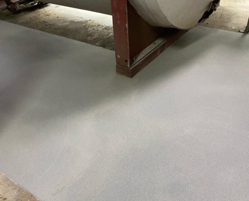 Commercial flooring system low areas of concrete after repair