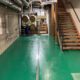 Urethane base with Epoxy top coat commercial flooring installation in Alaska