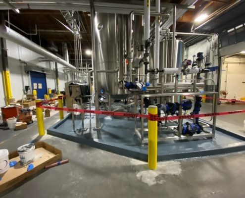 epoxy curbed production area at Portland Oregon bottling facility by Cascade floors.
